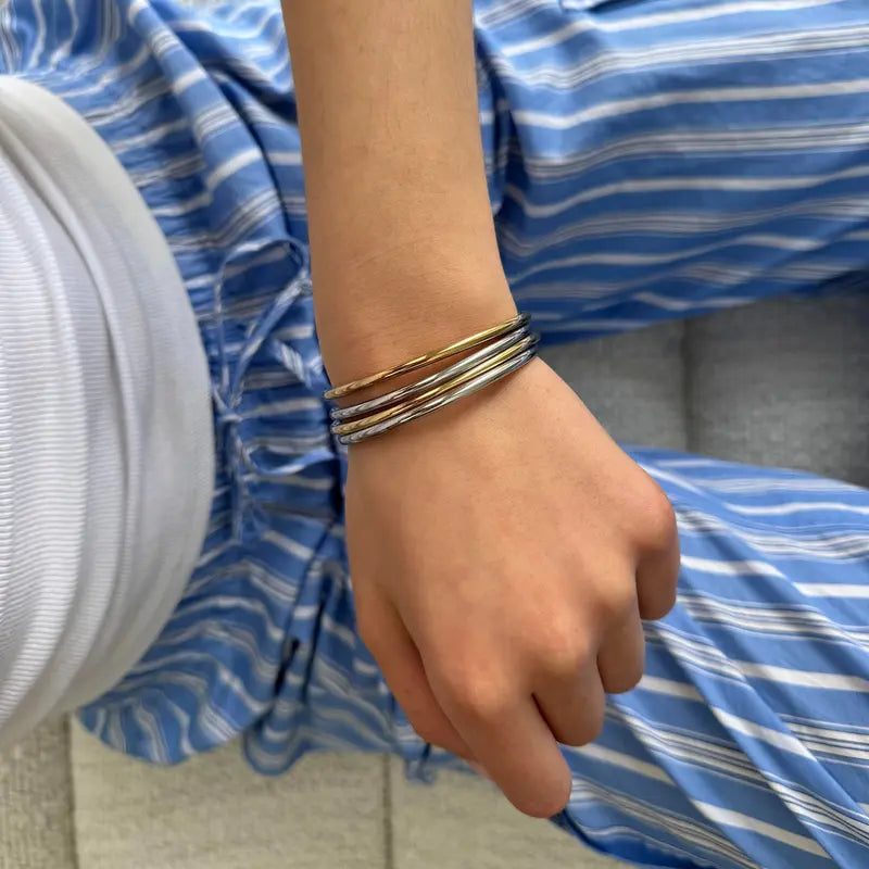 PAVOI Waterproof Bangle Bracelet for Women - 14K Gold Plated Classic Lightweight Stacking Stainless Steel Bracelet - 1-Piece & 2-Piece Bangles