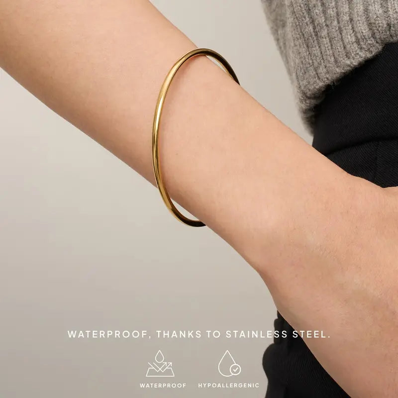 PAVOI Waterproof Bangle Bracelet for Women - 14K Gold Plated Classic Lightweight Stacking Stainless Steel Bracelet - 1-Piece & 2-Piece Bangles