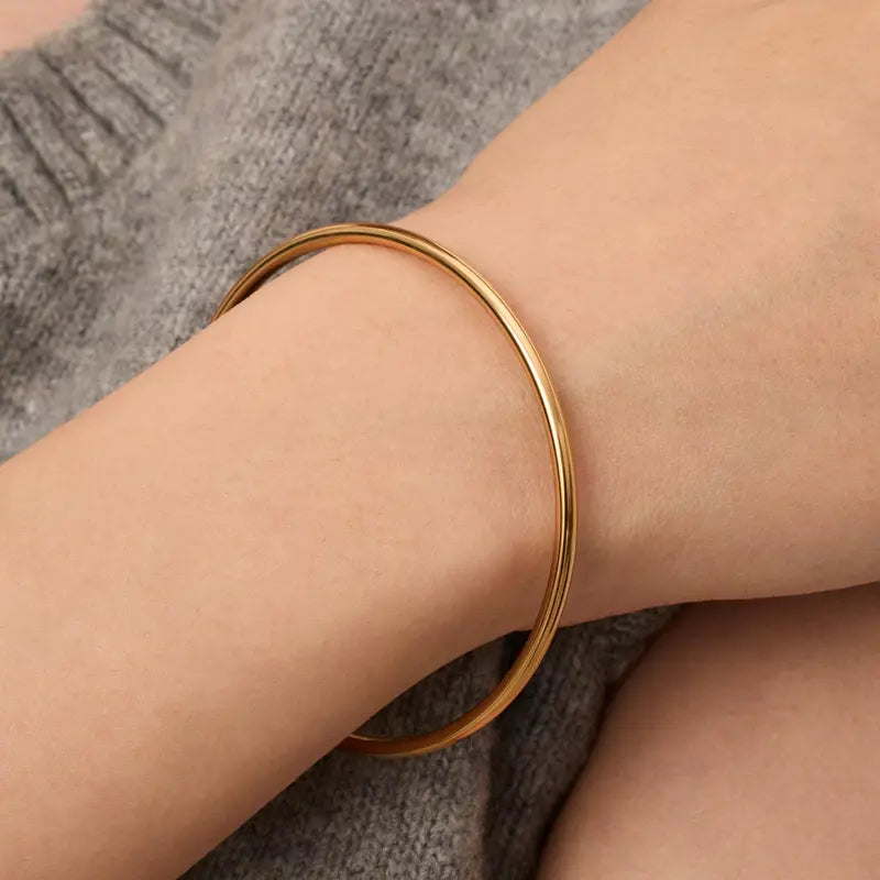 PAVOI Waterproof Bangle Bracelet for Women - 14K Gold Plated Classic Lightweight Stacking Stainless Steel Bracelet - 1-Piece & 2-Piece Bangles